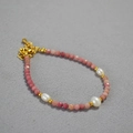 Detail of pink natural stone beaded necklace with freshwater pearls and gold lobster clasp - Bracelet