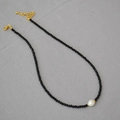 Detail of beaded choker with black spinel, baroque pearl and gold lobster clasp closure - Black Spinel