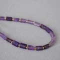 Artistic vintage necklace with faceted purple amethyst stone beads and golden spacers - Amethyst