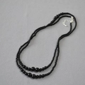 Elegant double-layered black onyx beaded necklace with gradient pearl size design - Black Agate