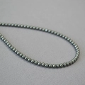 Collana minimalista con perle di Tahiti grigio scuro e lucentezza metallica fine - 4mm