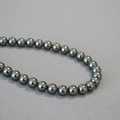 Collana di perle grigie tonde stile Tahiti con lucentezza metallica su tessuto - 8mm