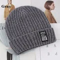 Close-up of a dark grey chunky knit beanie featuring a vintage California Dream woven label - Elastic 56-59cm / 1975 Pattern (1975 Gray) / Gray
