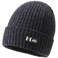 Macro detail of dark grey ribbed knit beanie with soft chenille texture and brand label - One Size / H-Label Gray