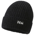 Detailed close-up of a black knit beanie featuring a white 'H' letter patch and ribbed texture - One Size / H-Label Black
