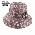 Khaki floral print bucket hat for women featuring a side bow and pearl detail - Adjustable 56-58cm / Khaki (Plum Blossom)