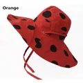 Chapeau de soleil à large bord pour femmes avec gros pois noirs sur fond orange pour la plage - Taille Unique 58cm / Orange