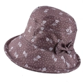 Detail of dark brown bucket hat featuring white leaf print and a side bow decoration - Adjustable 56-58cm / Khaki (Leaf Print)
