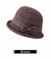 Détail d'un chapeau cloche marron en laine à motif pied-de-poule avec nœud latéral - Réglable 56-59cm / Marron