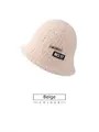 Close-up of beige fleece bucket hat with stylish patch detail and fluffy wool texture - One Size 58cm / Beige