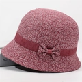 Detail of dark red floral bucket hat with cotton fabric and decorative side bow - All-over Floral Print Light Red