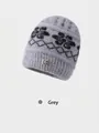 Bonnet d'hiver en tricot gris pour femme avec motif jacquard et boucle fleur dorée - Élastique 56-59cm / Gris