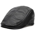 Détail d'une casquette en cuir noir montrant la texture grainée et les coutures apparentes - 56-59cm(Réglable) / Cuir Artificiel Premium Noir