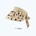 Detailed weave of beige sun visor with black polka dots and a decorative back bow - Adjustable 56-60cm / Beige