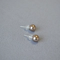 Detailed view of champagne brown pearls on silver studs with silicone backings - 8mm Stud Earrings