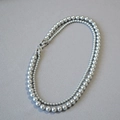 Collana a doppio filo di perle grigio argento con chiusura a nodo di zirconi luminosi - Grigio Argento