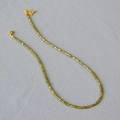 Close-up of olive green faceted beads necklace with gold lobster clasp and fine texture - Olive Green