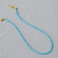 Detail of blue square crystal necklace with golden adjustable lobster clasp closure - Aqua