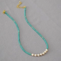 Detail of vintage necklace with turquoise beads, freshwater pearls and gold clasp - Greenish Necklace