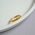 Sparkling gold dragon scale ring in vacuum plated finish on a white decorative plate - US 6 / Gold