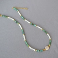 Ethnic beaded necklace with turquoise beads, pearls and large baroque shell centerpiece - Green White Gold