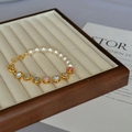 Vintage style bracelet with round pearls and colorful gemstone mosaic set in gold - Bracelet