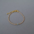 Detailed close-up of beaded bracelet with blue square crystal and gold clasp - Light Champagne Chain with Light Blue Square Bead / Aquamarine Bracelet