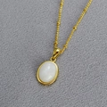 Minimalist gold necklace with a white oval natural stone pendant on a beaded chain - Blue Moonstone