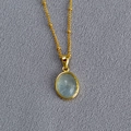 Minimalist gold necklace with oval gemstone pendant and beaded chain for elegant layering - Aquamarine