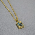 Collana dorata vintage con ciondolo rettangolare geometrico e pietra marmorizzata - Pietra dell'Imperatore Bluastra