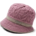 Detail of pink knitted bucket hat with thick plush texture and rhinestone baby logo - Elastic One Size / Pink