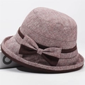 Macro detail of red textured sun hat with brown grosgrain ribbon and bow decoration - One Size 58cm / Khaki