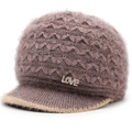 Detail of grey-pink knitted hat showing wavy texture and rhinestone LOVE logo ornament - Dust Rose