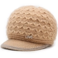 Close-up of light brown plush knitted hat with LOVE diamond pendant and textured pattern - Beige