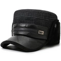 Detail of winter flat top cap with ear protection and textured leather brim for elderly men - Leather Trim Flat Top Large Blue Grid