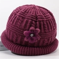 Purple winter knitted hat for elderly women with decorative floral accent and warm lining - One Size (56-59cm) / Fuschia