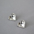 Minimalist silver heart stud earrings with a textured hammered finish for a modern look - Silver