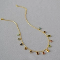 Detail of gold plated necklace featuring multi-colored zircon stones on a fine chain - Colorful Zirconia Geometric Pendant Necklace