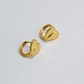 Detailed view of gold plated huggie hoop earrings with faceted 3D heart charms - Gold 3D Heart Huggie Hoop Earrings (5)