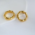 Macro detail of gold plated brass rings with organic bamboo texture on a white display - US 6 / Gold Irregular Bamboo Style Ring (5)
