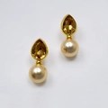Detailed macro view of teardrop amber crystal earrings with champagne pearl drops - Champagne Pearl Amber Stone Vintage Dangle Earrings (27)