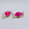 Macro shot of 18k gold plated brass candy-shaped earrings with glossy magenta enamel finish - Magenta Candy Shape Studs (9)