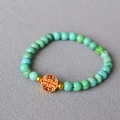 Detailed close-up of turquoise beads with a golden hollow cloud charm bracelet - Golden Hollow Lucky Cloud Bead Style(13)