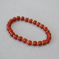 Bracciale minimalista in agata rossa con distanziali dorati e finitura lucida - Rosso