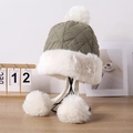 Winter aviator hat with green quilted fabric and white faux fur on a display stand - One Size 58cm / Army Green