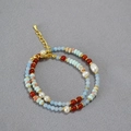 Close-up of double-layer necklace with blue stones, pearls and agate beads detail - Double Layer Bracelet