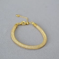 Elegant gold mesh chain necklace filled with shimmering crystals and a lobster clasp - Bracelet