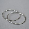 Detailed view of large silver oversized hoop earrings with smooth polished finish - Platinum 6cm