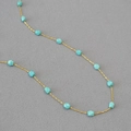 Minimalist gold beaded chain necklace with geometric blue turquoise stones in a retro style - Turquoise Style