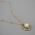 Baroque freshwater pearl pendant necklace with irregular geometric gold ring on bead chain - Water Drop Shape
